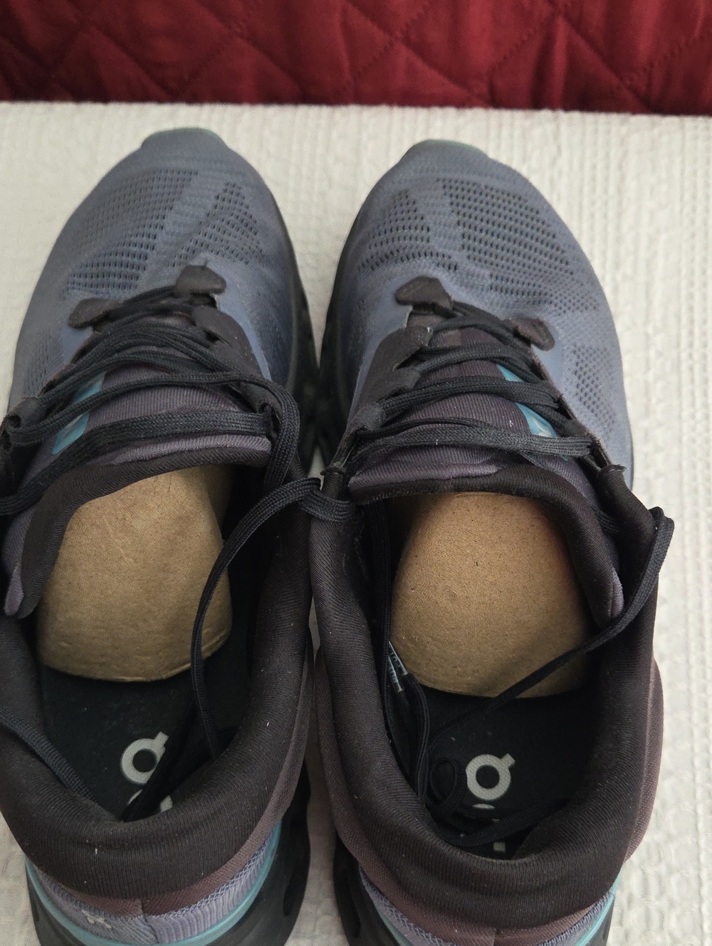 On Running Men's Gray and Black Knit Running Shoes with Blue Accent